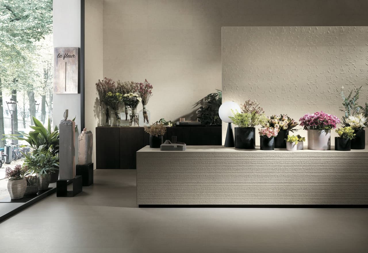 beige 3d textured stone ceramic wall tile showroom